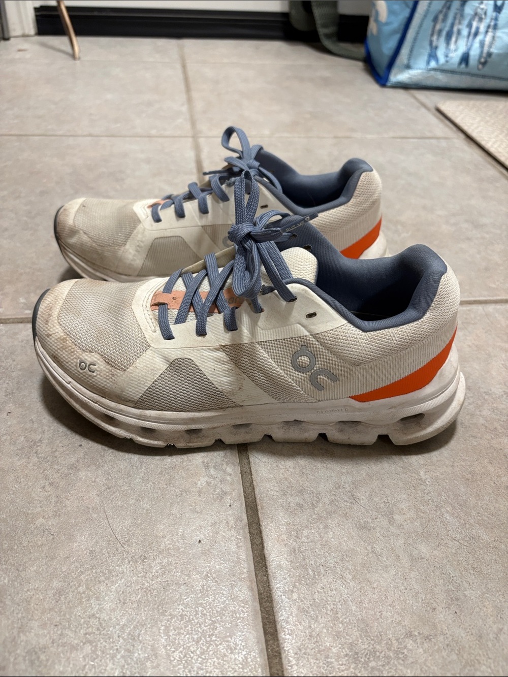 On Cloudrunner in White Sneakers with Orange and Navy Accents Women’s